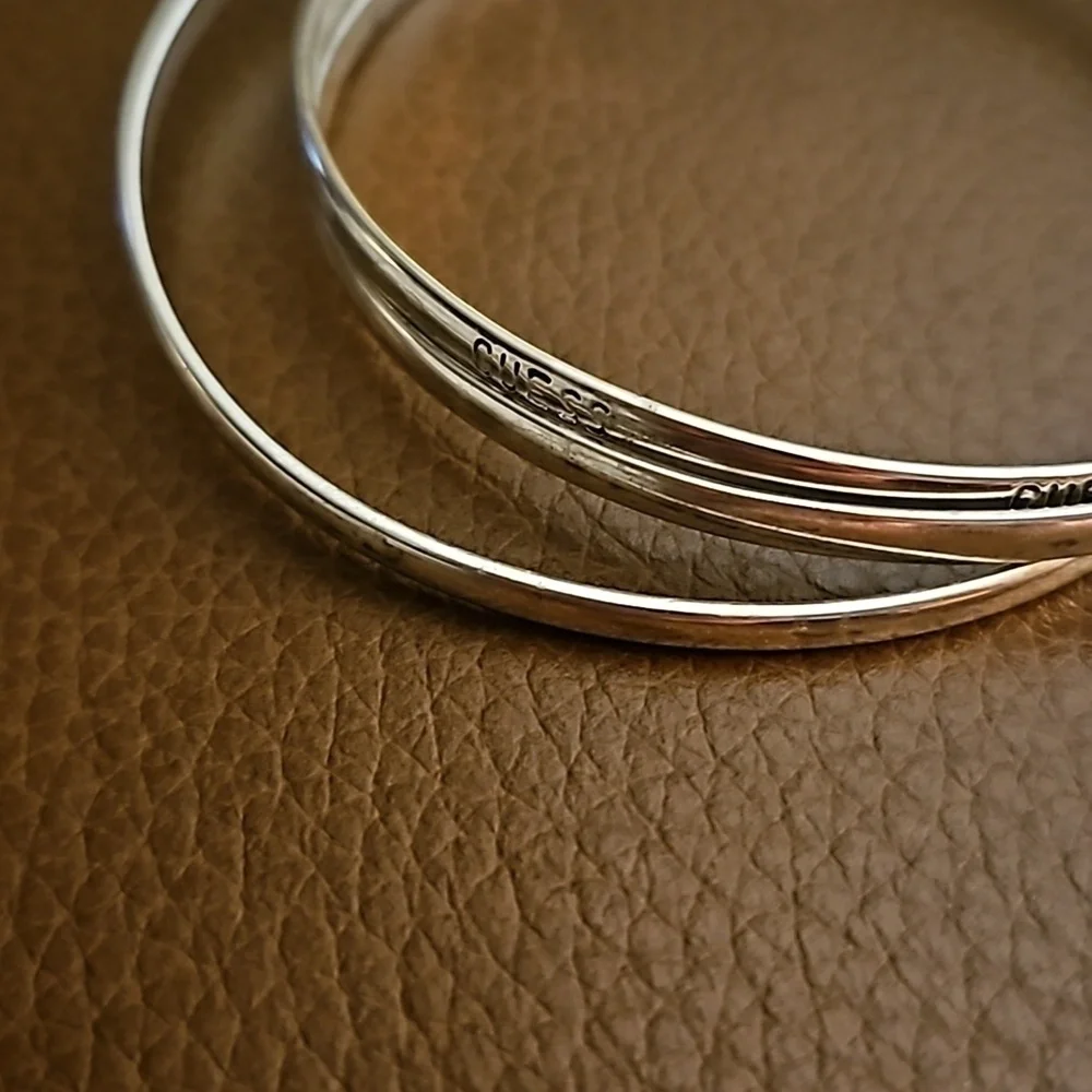 GUESS Dainty Interlocking Silvertone Bangle Bracelet